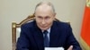 FILE - Russian President Vladimir Putin speaks during a meeting at the Kremlin in Moscow, Russia, Nov. 22, 2024. Putin has made "traditional family values" a cornerstone of his 25 years of power.