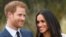 Britain's Prince Harry poses with Meghan Markle in the Sunken Garden of Kensington Palace, London, Britain, Nov. 27, 2017. 