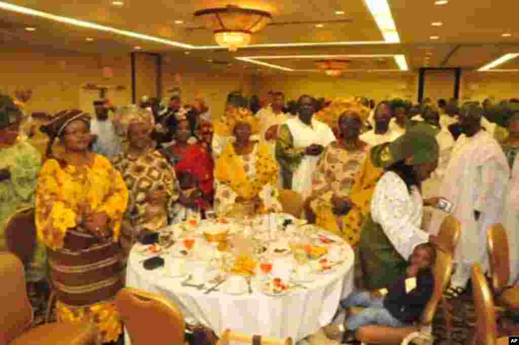 Members of the Owo community during dinner in honor of the Olowo and his queen
