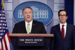 Secretary of State Mike Pompeo and Treasury Secretary Steve Mnuchin brief reporters about additional sanctions placed on Iran, at the White House, Jan. 10, 2019, in Washington.