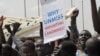 An anti-U.N. sign at a youth rally in Juba on March 10, 2014.