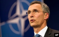 ຫົວໜ້າອົງການ NATO ທ່ານ Jens Stoltenberg ກ່າວຕໍ່ບັນດານັກຂ່າວ ຢູ່ກອງບັນຊາການ ທີ່ ນະຄອນ Brussels.
