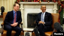 U.S. President Barack Obama, right, meets Britain's Prince William in the Oval Office of the White House in Washington, Dec. 8, 2014. 