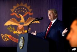 President Donald Trump speaks at a fundraiser in Fargo, N.D., Sept. 7, 2018.