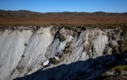 A land site with glacial mud is seen close to Nuuk, Greenland, September 10, 2021. REUTERS/Hannibal Hanschke