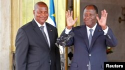 President of the Central African Republic Faustin Archange Touadera (left) and Ivory Coast President Alassane Ouattara at the presidential palace during Touadera's visit in Abidjan, Ivory Coast, Nov. 7, 2016.