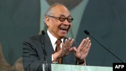 FILE - Architect I.M. Pei speaks after being honored with an Ellis Island 2004