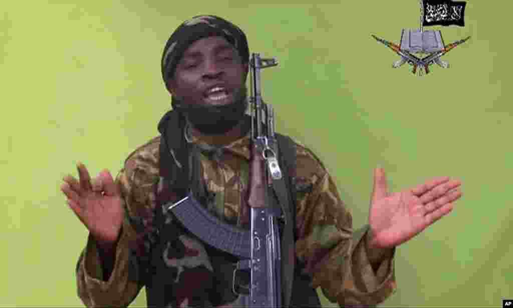 Abubakar Shekau, leader of Boko Haram, speaks to the camera in a video released by the extremist militant group, May 12, 2014.
