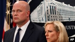 Acting Attorney General Matt Whitaker, left, and Homeland Security Secretary Kirstjen Nielsen, at the Justice Department in Washington.