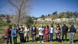 A crowd of dozens of Asian American communities gathers to raise awareness about the increase in hate crimes against Asians in the US near Chinatown Los Angeles, CA.