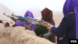 Afghan women who lost male family members in northern Jawzjan province of Afghanistan joined forces to fight Taliban and IS militants. (M. Bezhan/VOA)