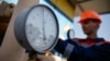 FILE - A pressure gauge is seen at a gas compressor station near Uzhhorod, western Ukraine, May 2014.