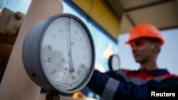 FILE - A pressure gauge is seen at a gas compressor station near Uzhhorod, western Ukraine.