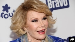 FILE - Joan Rivers attends the NBCUniversal Cable Entertainment 2014 Upfront at the Javits Center in New York, May 15, 2014. 