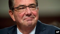 FILE - Defense Secretary Ash Carter testifies on Capitol Hill in Washington, Sept. 22, 2016. The Obama administration is announcing its support for requiring women to register for the military draft. 