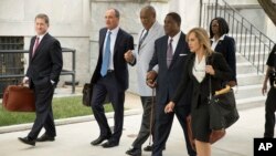Bill Cosby (C) departs after a pretrial hearing in his sexual assault case at the Montgomery County Courthouse in Norristown, Pa., Sept. 6, 2016.