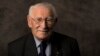 In this undated photo provided by the Sydney Jewish Museum, Holocaust survivor Eddie Jaku poses for a photograph in Sydney, Australia. 