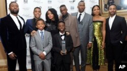 The cast of Moonlight, winners of the Jury Award for Ensemble Performance, pose for a photo at the IFP Gotham Independent Film Awards, Nov. 28, 2016, at Cipriani Wall Street in New York. 