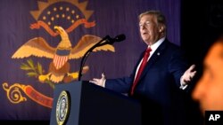 President Donald Trump speaks at a fundraiser in Fargo, N.D., Sept. 7, 2018.