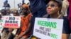 FILE - Supporters of the People's Democratic Party protest election results at the national headquarters of the Independent National Electoral Commission in Abuja, Nigeria, on March 6, 2023.