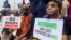 FILE - Supporters of the People's Democratic Party protest election results at the national headquarters of the Independent National Electoral Commission in Abuja, Nigeria, on March 6, 2023.