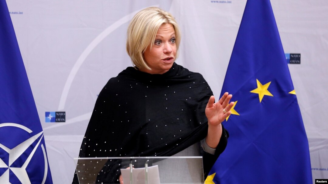 FILE - Then-Dutch Defense Minister Jeanine Hennis-Plasschaert delivers a speech in Brussels, Belgium, Feb. 16, 2017.