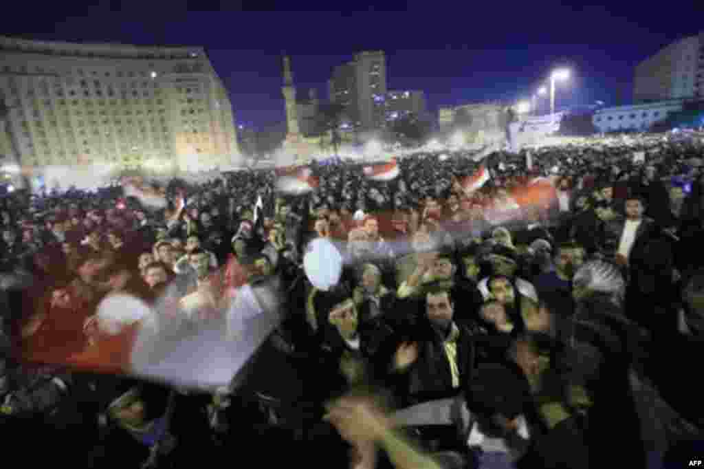 Anti-government protesters celebrate in Tahrir Square in downtown Cairo, Egypt Thursday, Feb. 10, 2011. Egypt's military announced on national television it had stepped in to secure the country and promised protesters calling for President Hosni Mubarak's