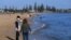 People enjoy the sunshine at Elwood beach in Melbourne, Australia, Sept. 14, 2020.