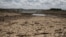 This photo shows the fast-drying catchment area of the Umzingwani dam in Matabeleland, southwestern Zimbabwe, Feb. 7, 2016. President Robert Mugabe had declared a state of disaster two days earlier in many rural areas hit by a severe drought.