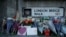 Tributes are seen at the southern end of London Bridge in London, Dec. 2, 2019, after a man previously convicted of terrorism offenses stabbed two people to death and injured three others before being shot dead by police. 