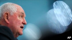 FILE - In this Feb. 27, 2019 file photo, Agriculture Secretary Sonny Perdue testifies during a House Agriculture Committee hearing, on Capitol Hill in Washington.