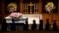 Members of the public walk past the casket of former first lady Barbara Bush at St. Martin's church, April 20, 2018, in Houston.