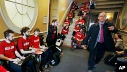 Protesters occupy University Hall at Harvard University in Cambridge, Mass., May 1, 2019. 