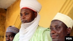 Sani Umar (center) is the “Sarkinyekin Gagi,” which means the “Great Warrior of Gagi." This title has been in his family for centuries but Nigerian royalty lost formal powers when the British colonials took over. (H. Murdock/VOA)
