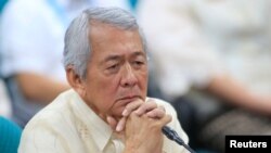 Philippine Foreign Secretary Perfecto Yasay gestures during a commission on Appointment hearing at the Senate headquarters in Pasay city, metro Manila, March 8, 2017.