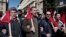 Members of pro-communist union PAME shout slogans during a protest in Athens, February 20, 2013. 