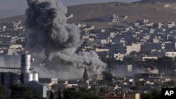 Dim posle vazdušnog napada koalicije koju predvode SAD