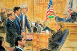 FILE - This sketch depicts President Donald Trump's former national security adviser Michael Flynn, standing center, flanked by lawyers, listening to U.S. District Judge Emmet Sullivan, right, inside the federal court in Washington, Dec. 18, 2018.