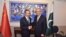 Pakistan's Foreign Minister Shah Mehmood Qureshi shakes hand with Chinese State Councilor and Foreign Minister Wang Yi at the Ministry of Foreign Affairs in Islamabad, Pakistan, Sept. 8, 2018. (Ministry of Foreign Affairs handout via Reuters).