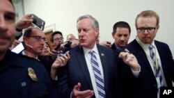 FILE - House Freedom Caucus Chairman Rep. Mark Meadows, R-N.C. speaks with the media on Capitol Hill in Washington, March 23, 2017, following a Freedom Caucus meeting. 