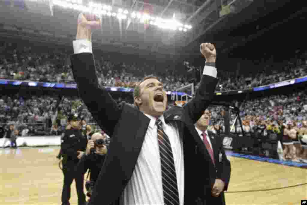 Lehigh head coach Brett Reed reacts at the end of an NCAA tournament second-round college basketball game against Duke in Greensboro, N.C., Friday, March 16, 2012. Lehigh won 75-70. (AP Photo/Chuck Burton)