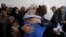Relatives of Palestinian Abdullah al-Shalalda, who was killed by Israeli undercover forces in a raid at Al-Ahly hospital, mourn at his funeral in the West Bank village of Sair, north of Hebron, Nov. 12, 2015. 