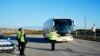 FILE - Copenhagen police stop a bus during a patrol at the border with Sweden on October 5, 2024. The Swedish intelligence agency Sapo said on October 3 that Iran may have been involved in explosions and gunfire around Israeli embassies in Sweden and Denmark.