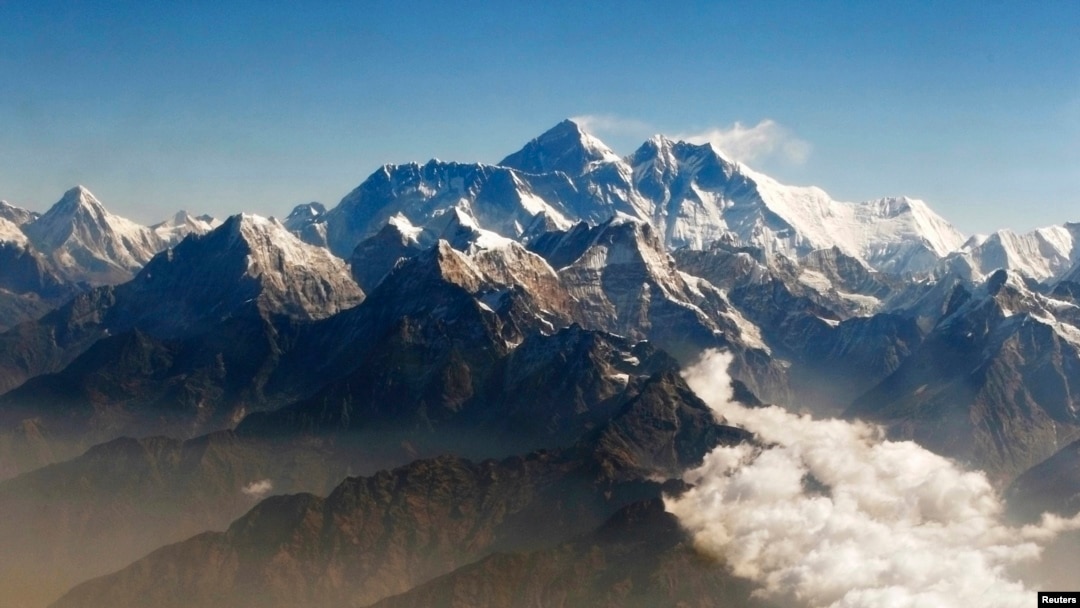 FILE - The Himalayan range of mountains, including Mount Everest (center), the world highest peak. 