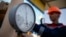 FILE - A pressure gauge is seen at a gas compressor station near Uzhhorod, western Ukraine, May 2014.