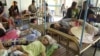 Cambodian infants sleep on beds in a crowded ward at Phnom Penh's National Pediatric Hospital, file photo. 