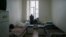 FILE - A patient is seen in a ward at the state-run Lavra clinic, Ukraine's main HIV treatment center, in Kyiv, Sept. 12, 2013. 
