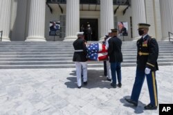 The casket with the body of civil rights icon Congressman John Lewis arrives at the Alabama Capitol, in Montgomery, Alabama, July 26, 2020.