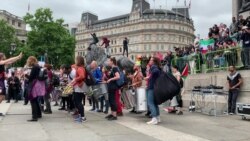 Samba Drum Band Warms Up Protesters in London