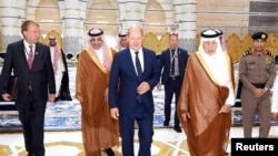 Governor of Mecca Khalid Bin Faisal Al Saud receives German Chancellor Olaf Scholz at Jeddah airport